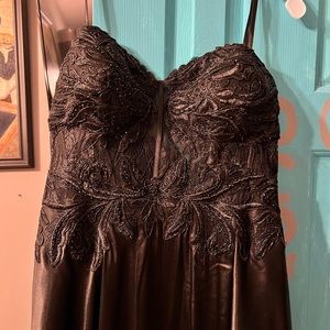 Prom dress. Sleeveless corset style. Never worn and never altered. Size 15.